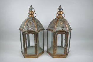 A pair of coppered metal hexagonal lanterns, 49cm high