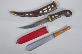 A Turkish dagger Jambiya, with mother of pearl inlaid wood handle and sheath, and brass mounts,