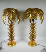 A pair of gilt metal table lamps in the form of palm trees, 72cm high