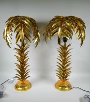 A pair of gilt metal table lamps in the form of palm trees, 72cm high