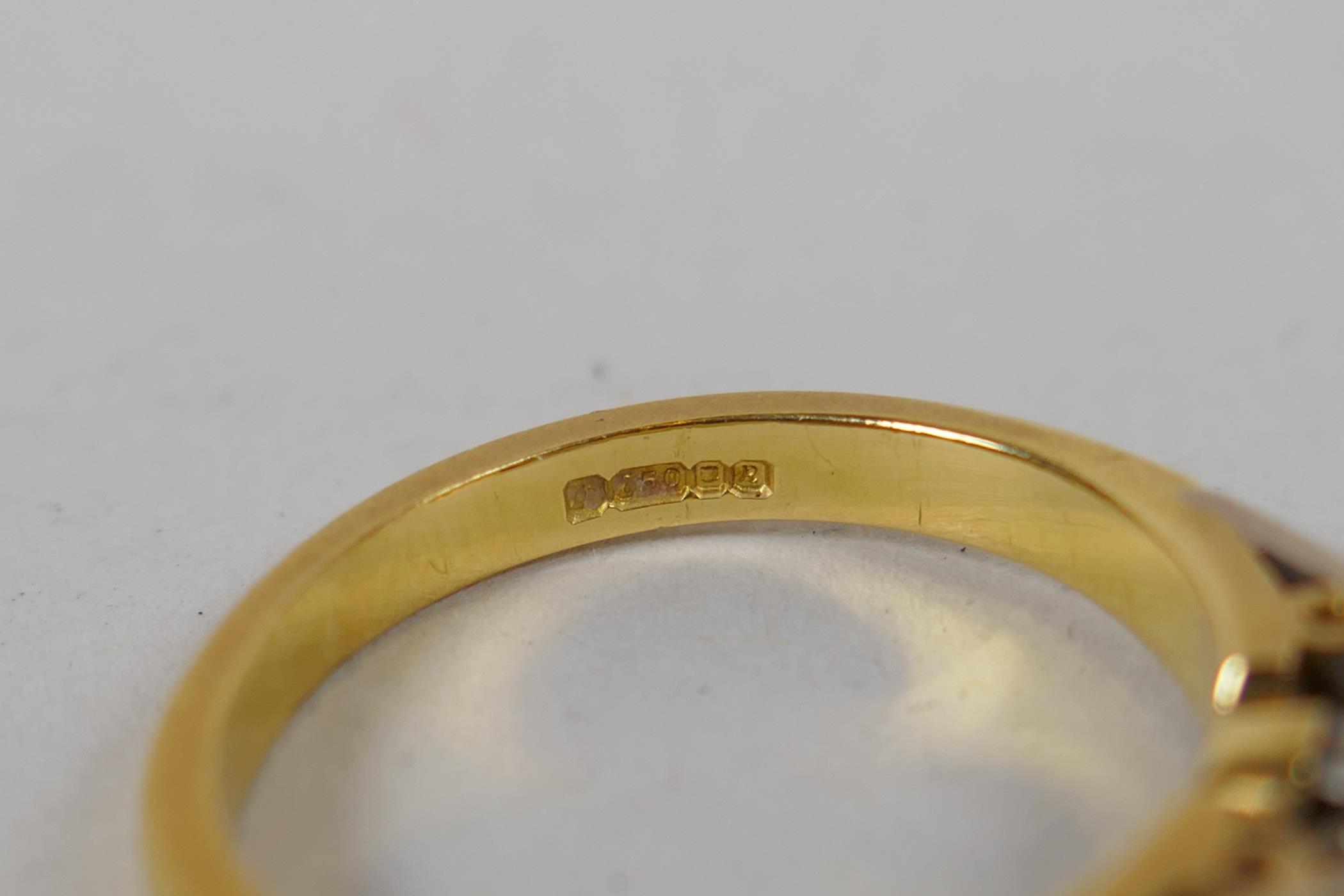 An 18ct yellow gold and diamond ring, with a central set diamond and three diamonds set to each - Image 5 of 5
