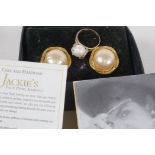 A pair of faux pearl 'Jackie's' (Kennedy) replica earrings, and a 9ct gold ring set with a large