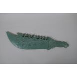 A Chinese carved mottled green hardstone chopper, 51cm long