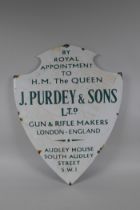 A vintage style James Purdey & Sons Ltd shield shaped enamel sign, 39 x 51cm