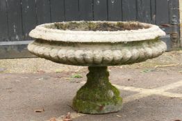 A vintage reconstituted stone urn on column base, 78cm diameter