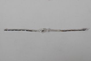 An Iranian white gold and diamond set bracelet, AF, gold untested, 12g gross, indistinctly marked
