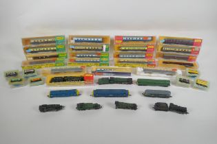 A large quantity of Hornby Minitrix, Atlas, TRIX, Lima etc N gauge locomotives and rolling stock,