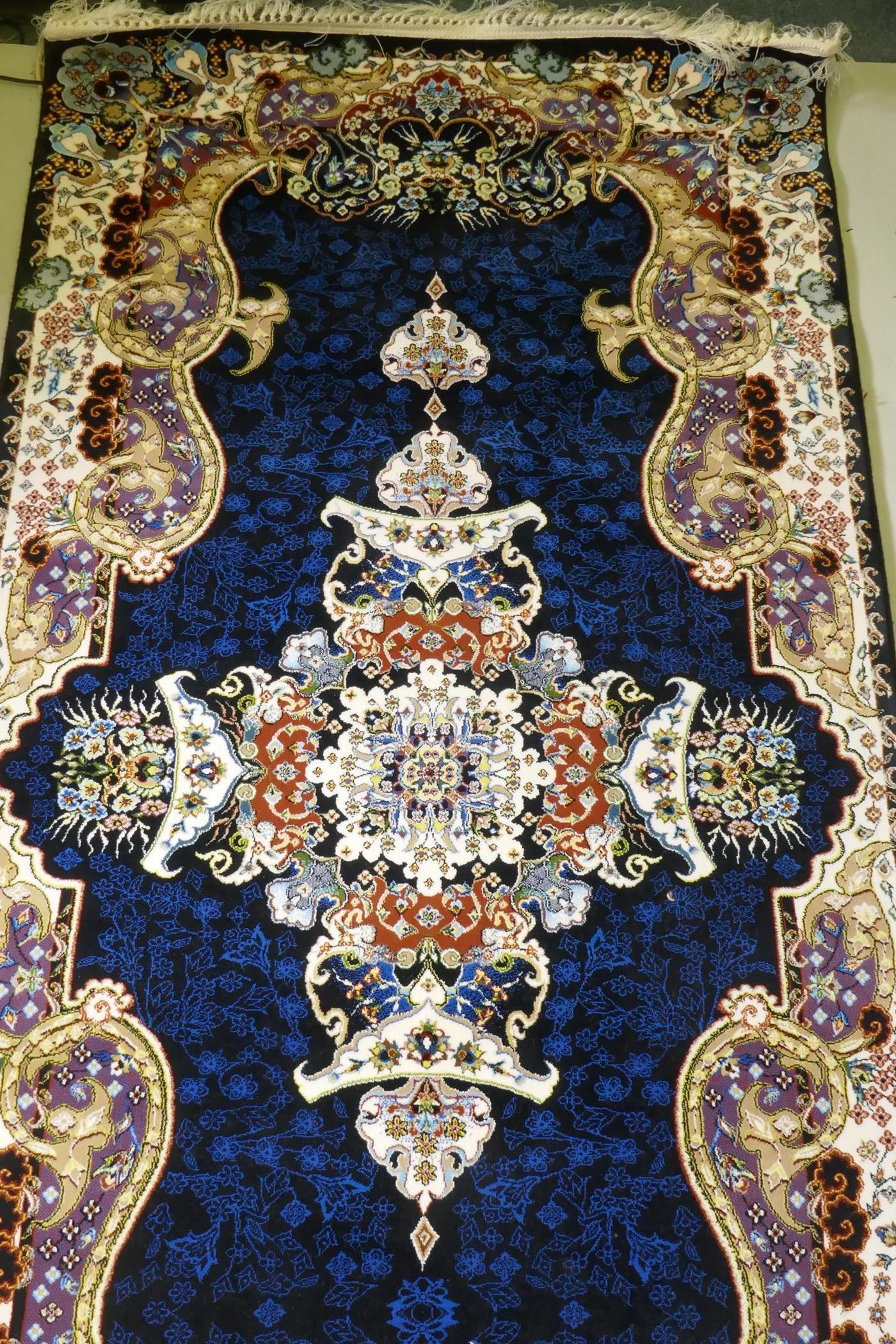 An Iranian fine woven runner with floral medallion design on a deep blue field, 100x  410cm - Image 7 of 8