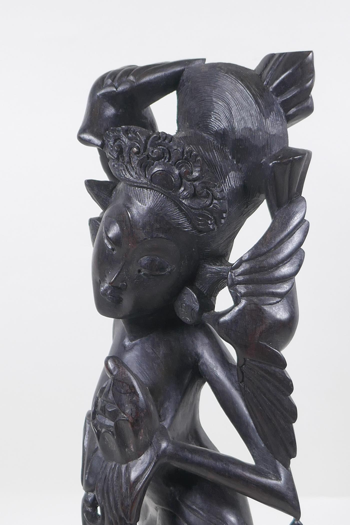 A Balinese carved hardwood figure of a dancer, 45cm high - Image 3 of 5