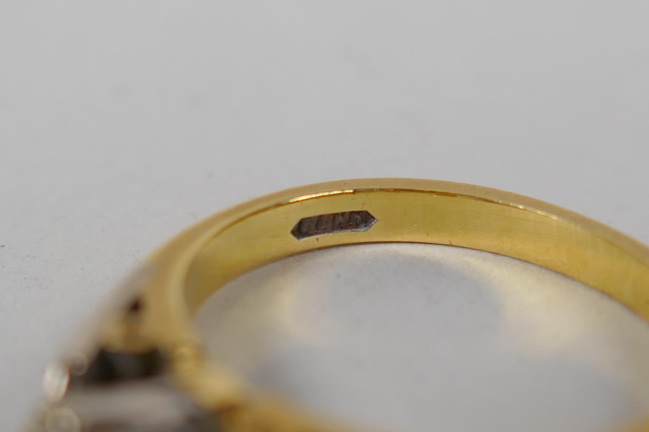 An 18ct yellow gold and diamond ring, with a central set diamond and three diamonds set to each - Image 4 of 5