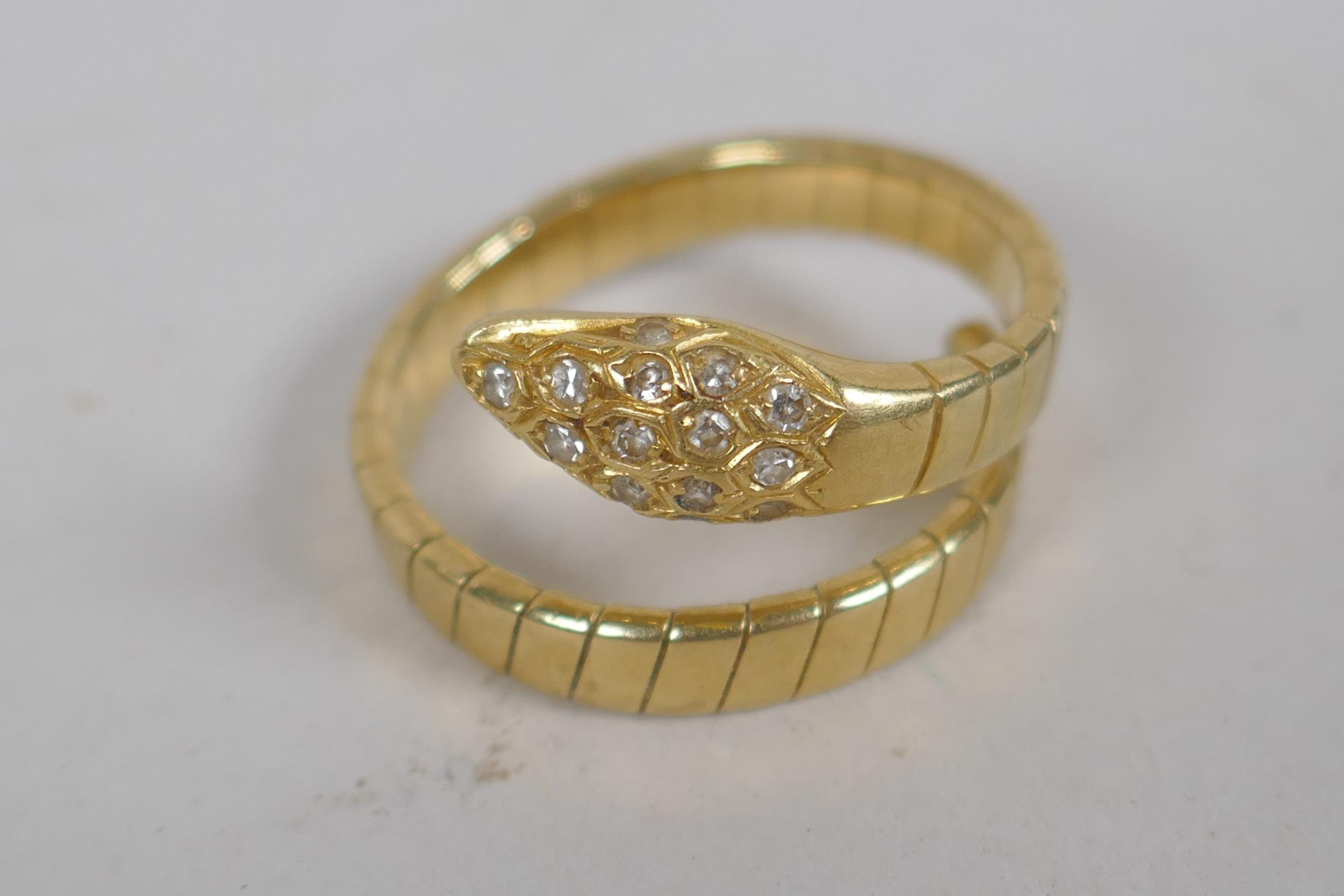 An 18ct gold snake ring, the head and eyes set with diamonds, 7.3g approx size N - Image 2 of 3