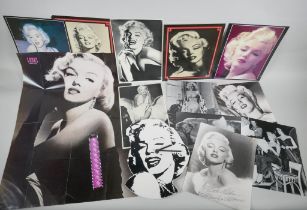 A quantity of Marilyn Monroe ephemera to include press photographs, lobby cards, posters,