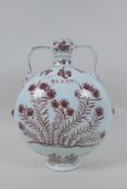 A red and white porcelain two handled moon flask with floral decoration, Chinese Xuande 6