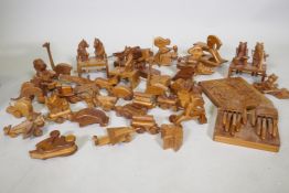 A collection of wood puzzles and toys, aeroplane, 26cm long