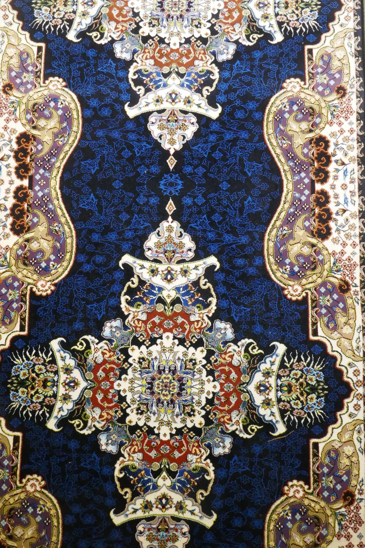 An Iranian fine woven runner with floral medallion design on a deep blue field, 100x  410cm - Image 5 of 8