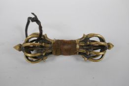 A Tibetan bronze vajra, 15cm long