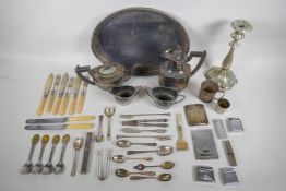 A quantity of silver plate to include tea sets, flat ware, lighters, cigarette cases, trays etc