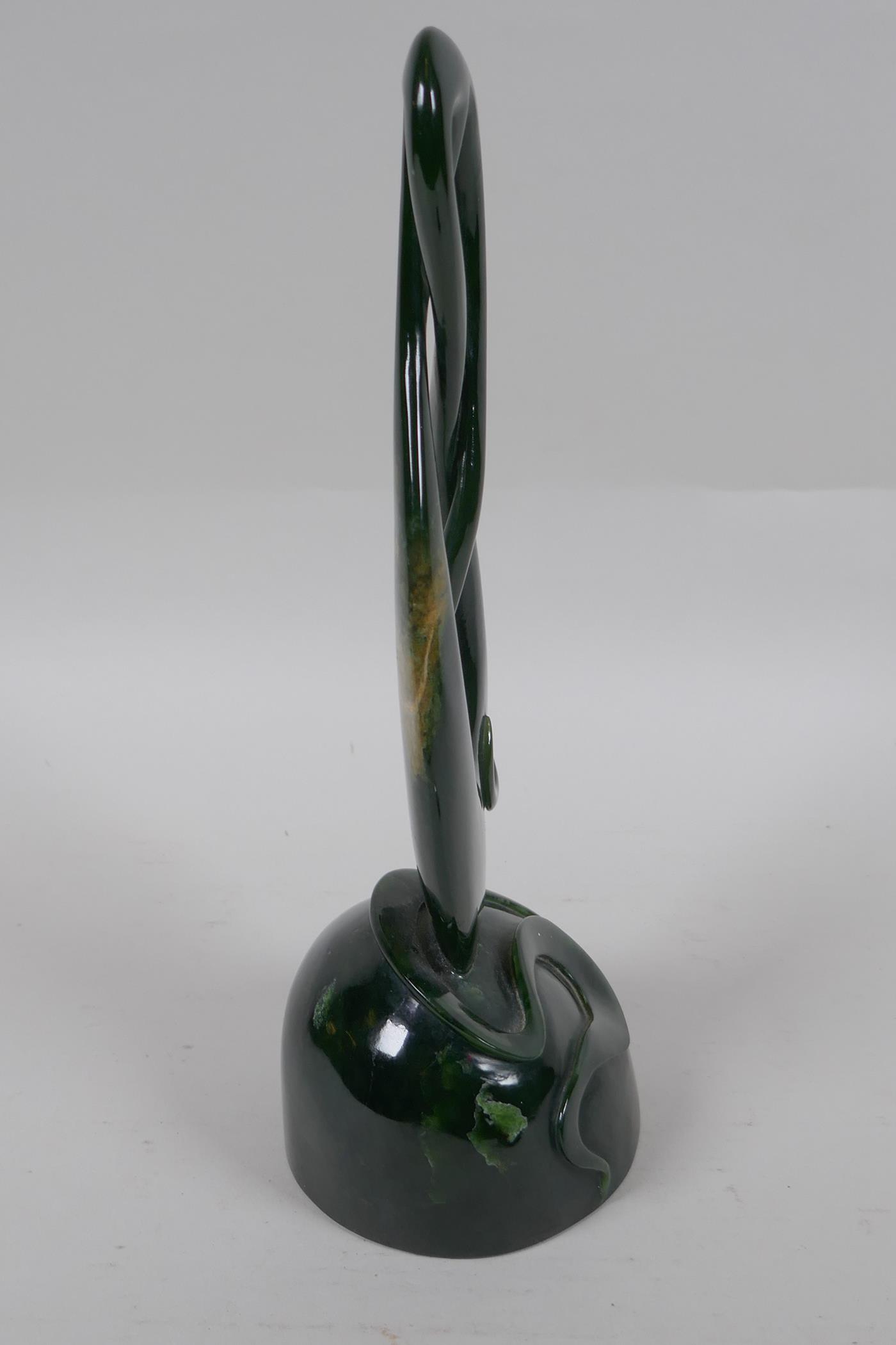 A carved New Zealand spinach jade (Pounamu) abstract sculpture, 27cm high - Image 4 of 4