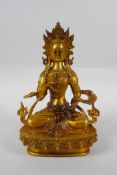 A Tibetan gilt bronze figure of Vajrasuttra, double vajra mark to base, 20cm high