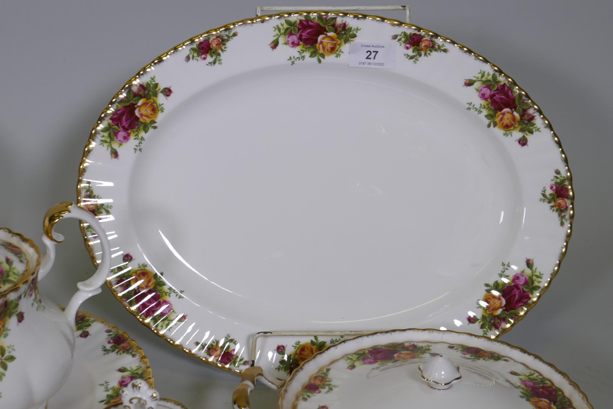 A Royal Albert Country Rose six place dinner service, with serving plates, tureens etc, appears - Image 3 of 7