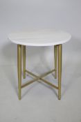 A contemporary stone topped occasional table with gilt metal legs, 44cm high x 43cm diameter