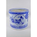 A Chinese blue and white porcelain cylinder jardiniere, with landscape and floral decoration, 26cm