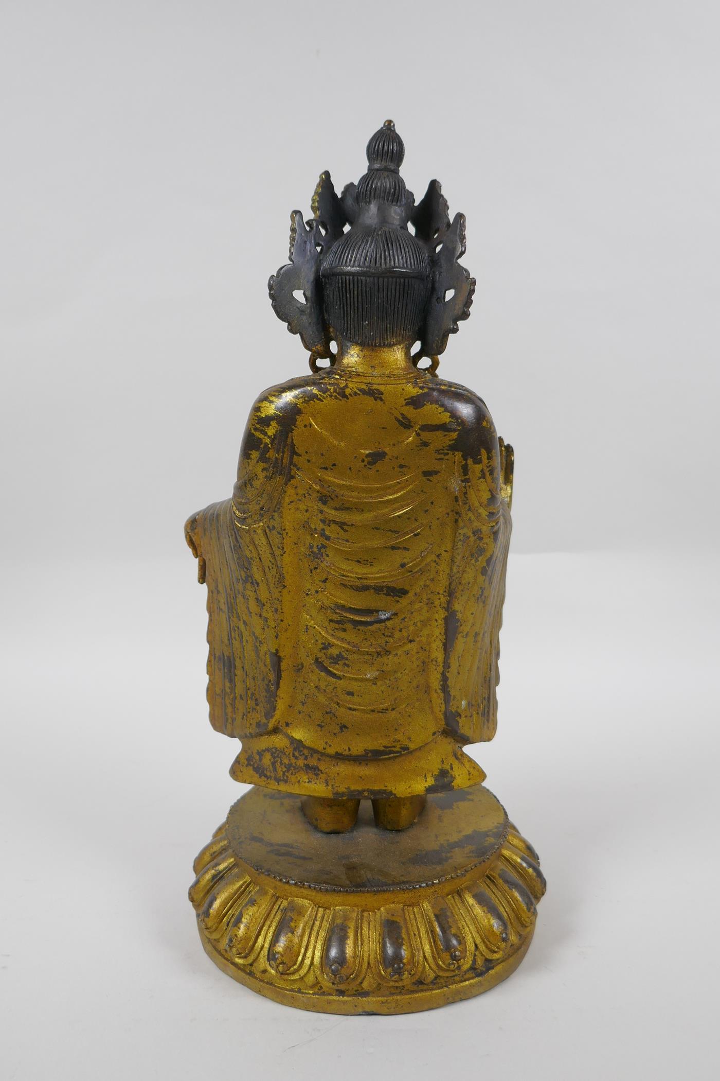 A Sino Tibetan gilt bronzed metal Buddha, 32cm high - Image 3 of 3