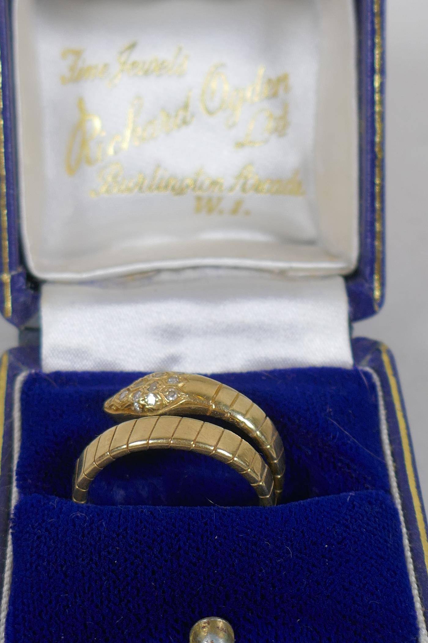 An 18ct gold snake ring, the head and eyes set with diamonds, 7.3g approx size N - Image 3 of 3
