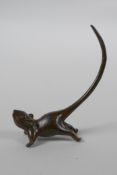 A Japanese style bronze okimono rat, 8cm high