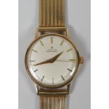 A 9ct gold gentleman's Zenith Automatic wrist watch with gold hands and batons, 53g gross