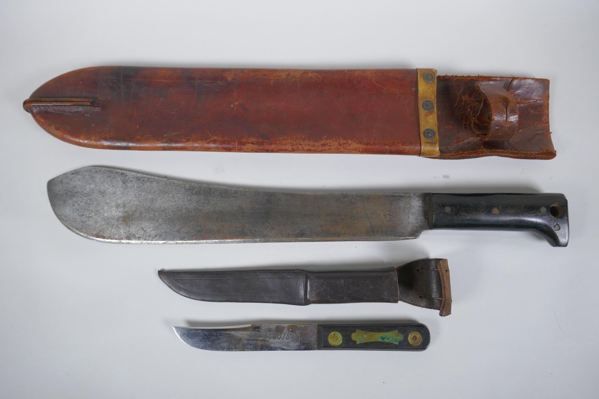 A WWII US made machete by Legitimus Collins & Co, model no. 1250, and a British made Boy Scout's