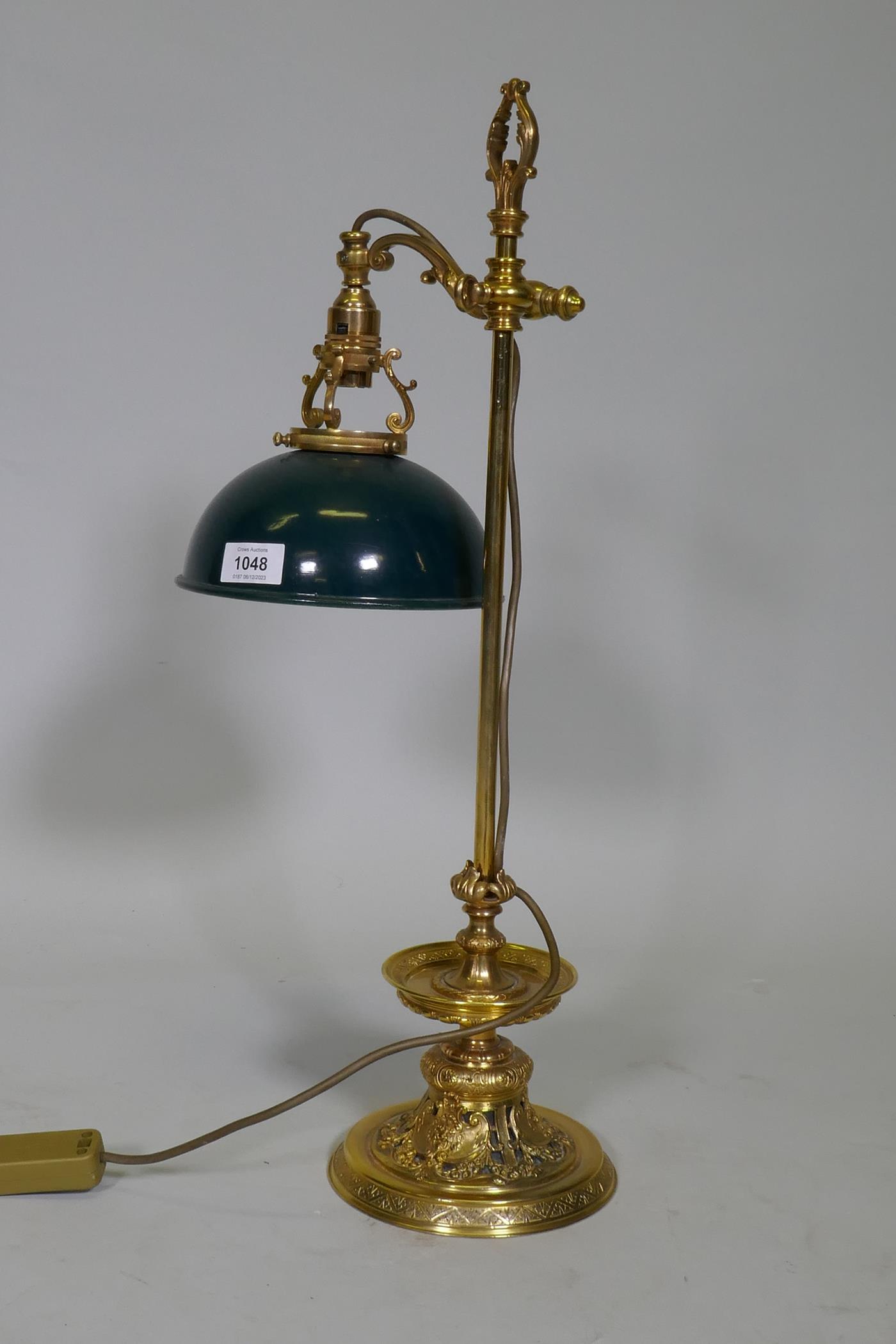 An ormolu table lamp with adjustable painted toleaware shade, the base with fine engraved and - Image 2 of 3