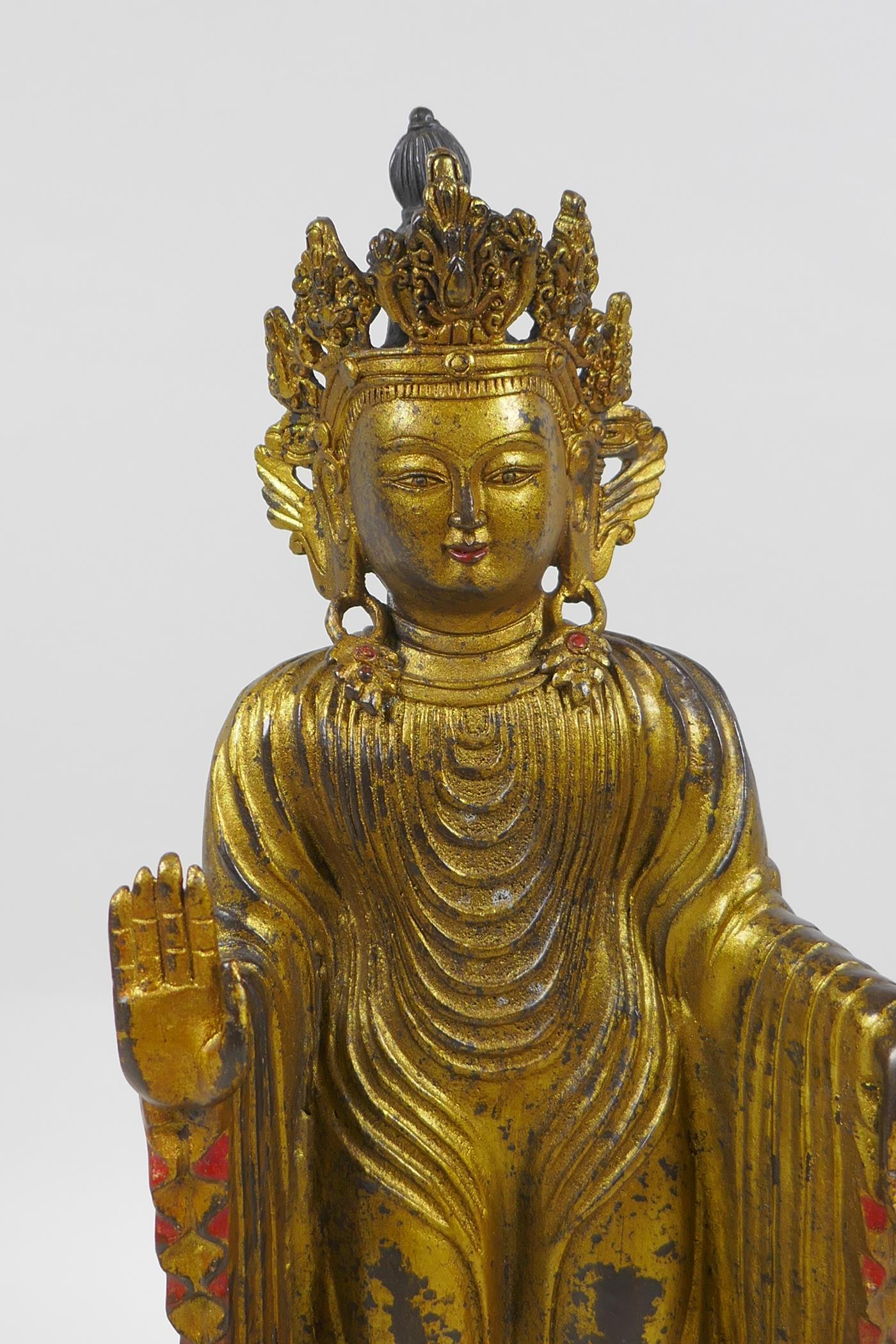 A Sino Tibetan gilt bronzed metal Buddha, 32cm high - Image 2 of 3
