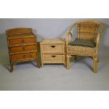 A wicker arm chair and two 2 drawer chests