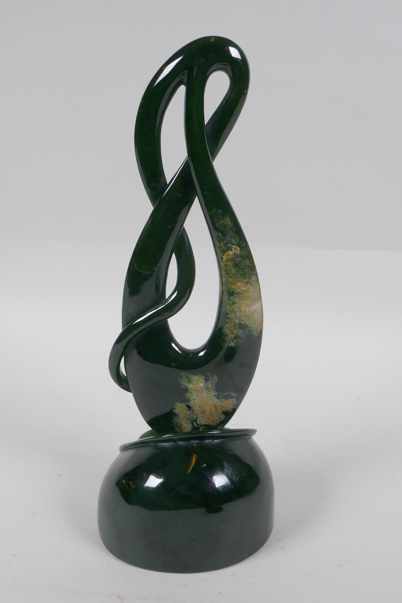 A carved New Zealand spinach jade (Pounamu) abstract sculpture, 27cm high - Image 3 of 4