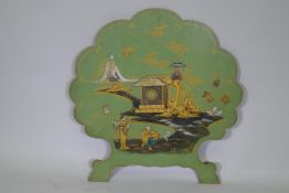 A 1920s lacquered wood fire screen with raised chinoiserie decoration, 75 x 77cm high