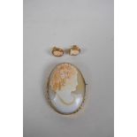 An antique yellow metal mounted cameo brooch, and a pair of 9ct gold mounted cameo earrings,