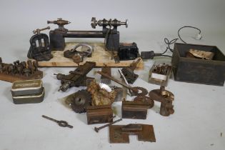 Putta of Manchester watchmaker's lathe, with associated collets and tools