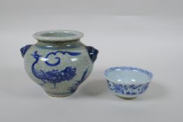 A Chinese Ming style blue and white porcelain tea bowl with phoenix decoration, and a Ming style