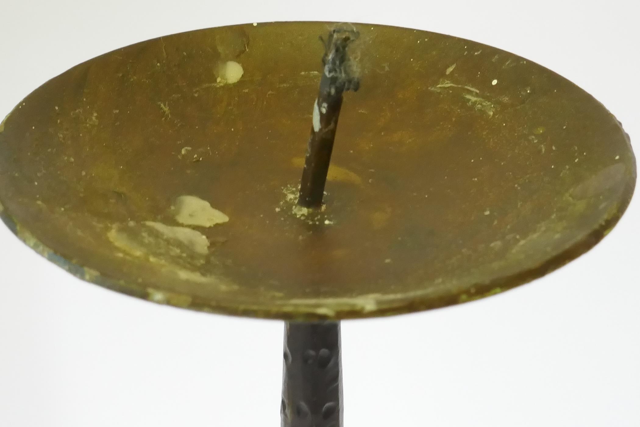 A wrought iron floor standing pricket candlestick on tripod supports, 128cm high - Image 3 of 3