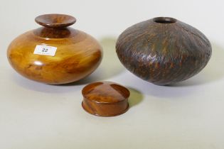 Treen, a New Zealand Rimu and Totana burr wood turned pot, signed to base Jim Ross, 19cm diameter,