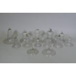 A collection of antique glass bell jars, largest 30cm high