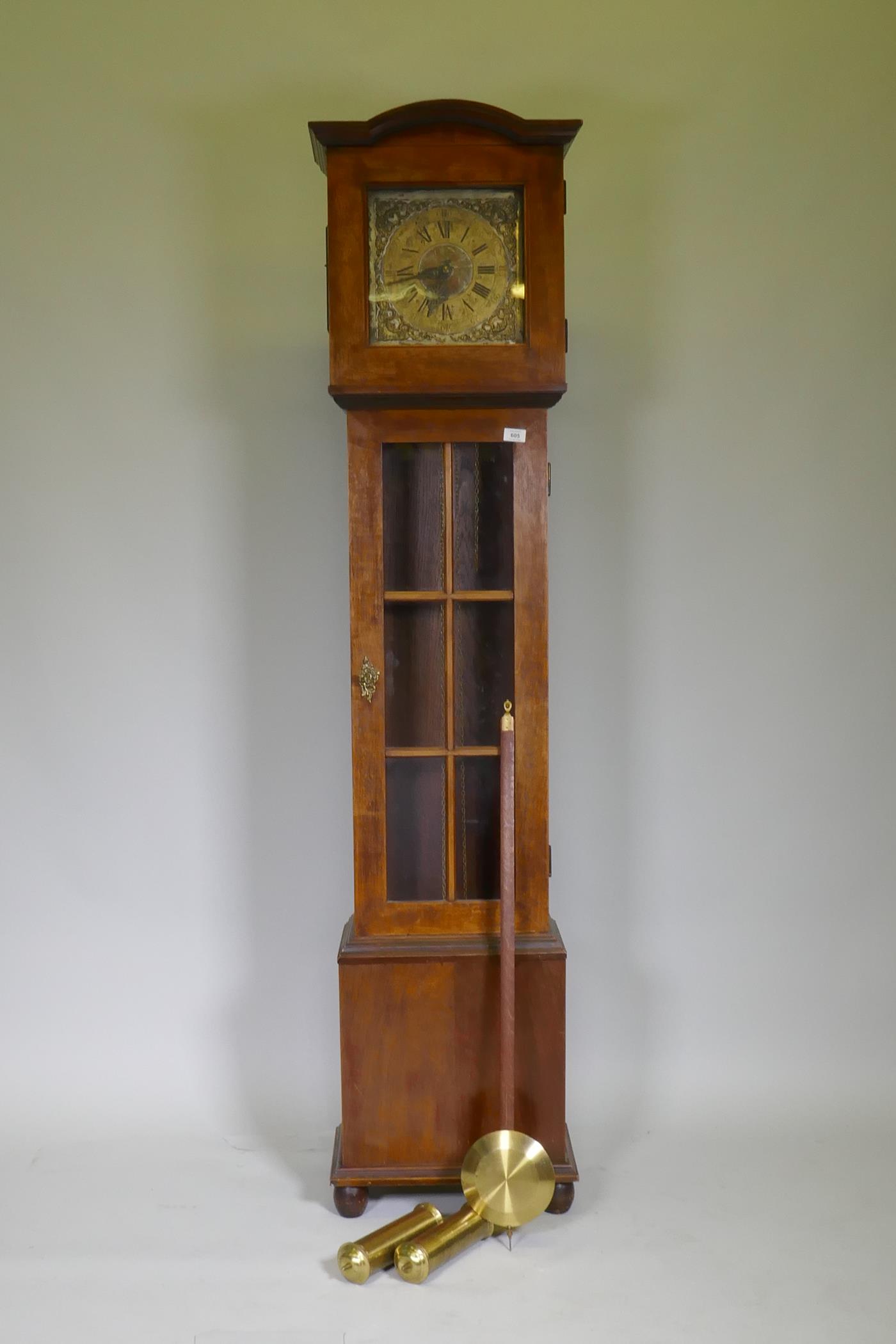 An early mahogany case longcase clock with glazed door and brass and silvered dial, the movement