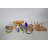 A collection of glass paperweights, including a Charles Sorrel Studio, carnival glass bowl, dressing
