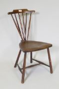 An Arts and Crafts side chair in the manner of Liberty & Co