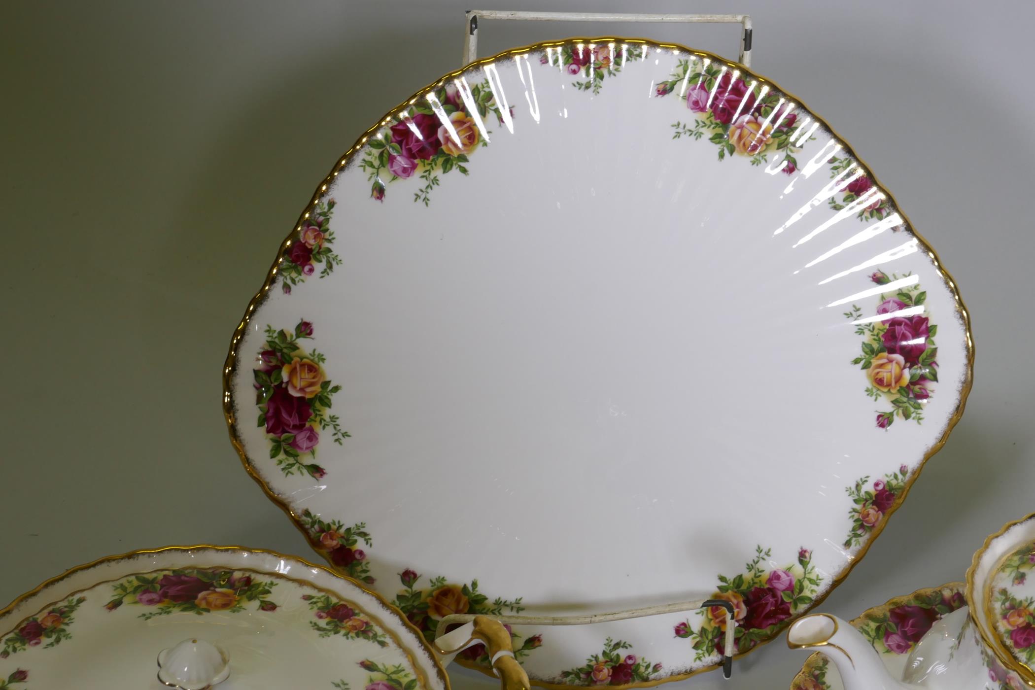 A Royal Albert Country Rose six place dinner service, with serving plates, tureens etc, appears - Image 4 of 7