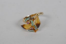 An Italian yellow metal leaf and butterfly ring, set with rubies and emeralds, approx size O