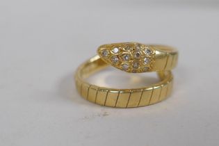 An 18ct gold snake ring, the head and eyes set with diamonds, 7.3g approx size N
