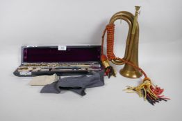 Trevor James, 10 x E silver plated flute, No 66148, in case, and a vintage brass bugle, 30cm long