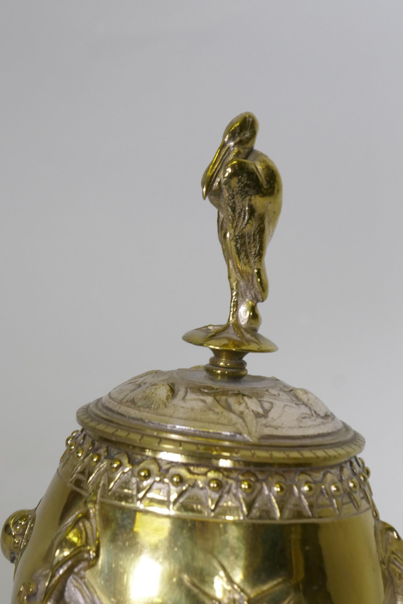 After August Cain, silver and gilt plated urn and cover, with stork finial, with raised decoration - Image 2 of 6